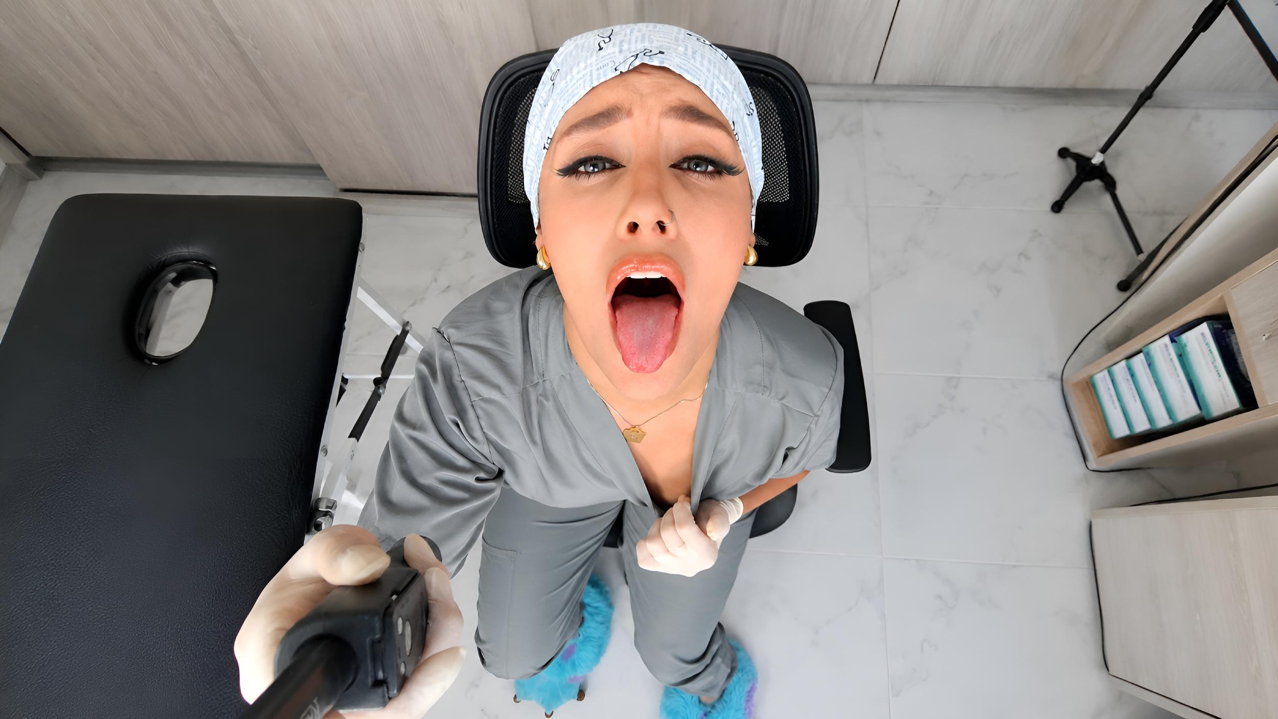 Sylvana in grey surgical scrub suit for medical roleplay photo session